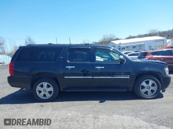 2009 Chevrolet Suburban LTZ with VIN 1GNFK36399J124158, listed as a IAAI auction lot 42063097 with 204,856 mi miles. Bid and sale history available at carsss.com. Image 13.