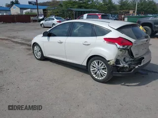 2017 Ford Focus Titanium with VIN 1FADP3N24HL331009, listed as a IAAI auction lot 42029193 with 82,068 mi miles and . Bid and sale history available at carsss.com. Image 3.