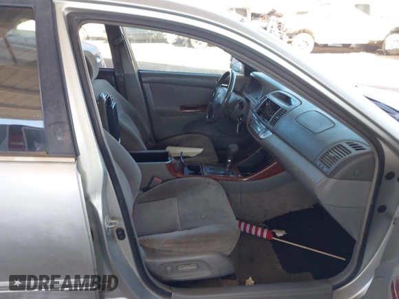 2003 Toyota Camry LE with VIN JTDBE32K730176610, listed as a IAAI auction lot 41627010 with 238,502 mi miles and . Bid and sale history available at DreamBid. Image 5.