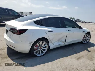 2021 Tesla Model 3 Long Range z VIN 5YJ3E1EB7MF093184, wystawiony jako Copart lot #58060385 z przebiegiem 51 678 mil mil oraz Nie do naprawy • Non repairable. Historia ofert i sprzedaży dostępna na DreamBid. Obrazek 3.