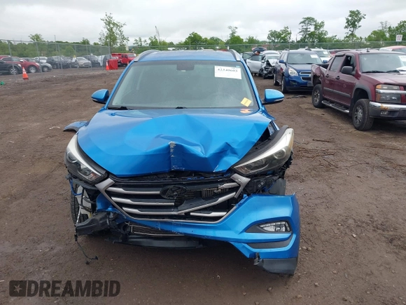 2017 Hyundai Tucson Sport z VIN KM8J33A23HU319048, wystawiony jako IAAI lot #42340603 z przebiegiem 51 738 mil mil oraz . Historia ofert i sprzedaży dostępna na DreamBid. Obrazek 13.