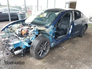 2023 Tesla Model 3 z VIN 5YJ3E1EA9PF566224, wystawiony jako IAAI lot #42292218 z przebiegiem 22 730 mil mil oraz . Historia ofert i sprzedaży dostępna na DreamBid. Obrazek 2.