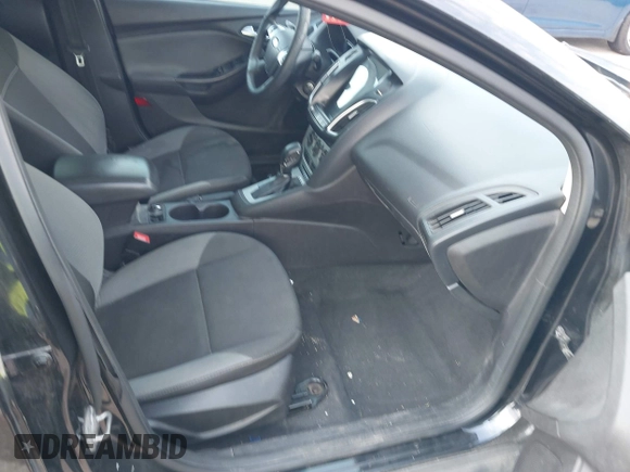 2014 Ford Focus SE with VIN 1FADP3F21EL157488, listed as a IAAI auction lot 42120325 with 198,658 mi miles and . Bid and sale history available at DreamBid. Image 5.