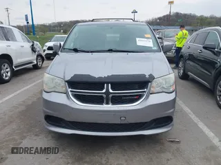 2014 Dodge Grand Caravan SXT with VIN 2C4RDGCG0ER417662, listed as a IAAI auction lot 41933279 with 156,751 mi miles and . Bid and sale history available at DreamBid. Image 12.