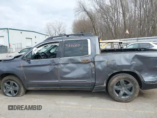 2023 Honda Ridgeline RTL z VIN 5FPYK3F58PB014460, wystawiony jako IAAI lot #41875307 z przebiegiem 77 565 mil mil oraz . Historia ofert i sprzedaży dostępna na DreamBid. Obrazek 14.