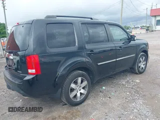 2013 Honda Pilot Touring z VIN 5FNYF3H93DB021700, wystawiony jako IAAI lot #42343744 z przebiegiem 224 264 mil mil oraz . Historia ofert i sprzedaży dostępna na DreamBid. Obrazek 4.