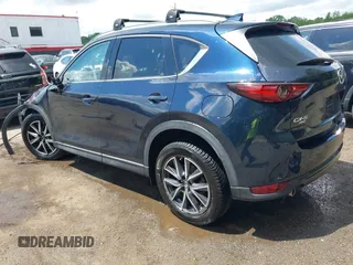 2018 Mazda CX-5 Grand Touring with VIN JM3KFBDM2J0373386, listed as a IAAI auction lot 42200795 with 70,111 mi miles and . Bid and sale history available at DreamBid. Image 3.