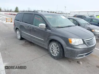 2015 Chrysler Town & Country Touring-L with VIN 2C4RC1CG4FR620989, listed as a IAAI auction lot 41407089 with 146,589 mi miles. Bid and sale history available at carsss.com. Image 1.