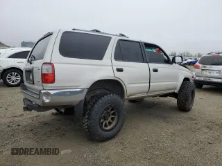 1999 Toyota 4Runner z VIN JT3HM84R3X0034771, wystawiony jako Copart lot #84952924 z przebiegiem 261 449 mil mil oraz Szkoda całkowita • Salvage title. Historia ofert i sprzedaży dostępna na DreamBid. Obrazek 3.