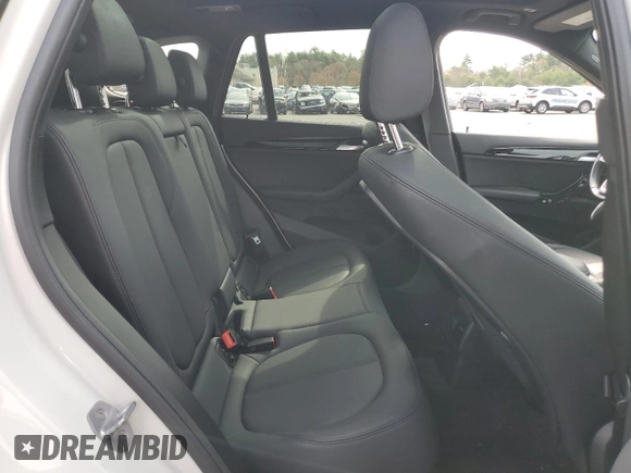 2019 BMW X1 xDrive28i z VIN WBXHT3C56K5L89903, wystawiony jako Copart lot #53606545 z przebiegiem 46 978 mil mil oraz Szkoda całkowita • Salvage title. Historia ofert i sprzedaży dostępna na DreamBid. Obrazek 11.