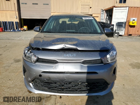 2023 Kia Rio LX with VIN 3KPA24AD6PE572943, listed as a Copart auction lot 48073475 with 34,677 mi miles and Salvage Title. Bid and sale history available at DreamBid. Image 5.