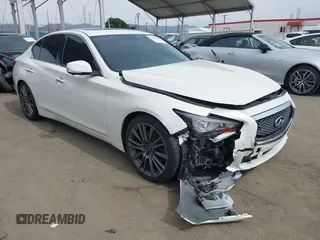 2014 Infiniti Q50 Hybrid Sport with VIN JN1AV7AP0EM692242, listed as a IAAI auction lot 41611952 with 125,296 mi miles and . Bid and sale history available at DreamBid. Image 1.