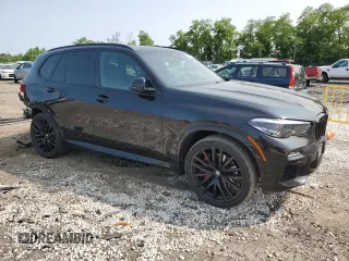 2021 BMW X5 xDrive40i with VIN 5UXCR6C07M9H68711, listed as a Copart auction lot 58984535 with 35,826 mi miles and Salvage title. Bid and sale history available at DreamBid. Image 4.