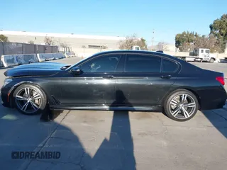 2018 BMW 7 Series 750i with VIN WBA7F0C50JGM24160, listed as a IAAI auction lot 41448519 with 138,742 mi miles. Bid and sale history available at carsss.com. Image 14.