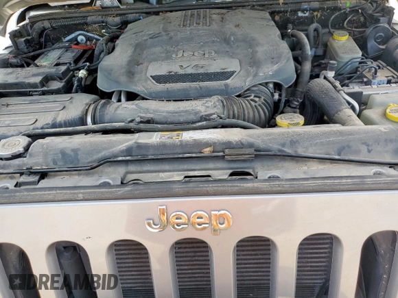 2015 Jeep Wrangler Unlimited Rubicon z VIN 1C4BJWFG0FL529310, wystawiony jako Copart lot #64337405 z przebiegiem Nie podano mil oraz Szkoda całkowita • Salvage title. Historia ofert i sprzedaży dostępna na DreamBid. Obrazek 11.