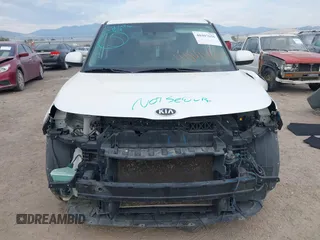 2020 Kia Soul LX with VIN KNDJ23AU0L7056999, listed as a IAAI auction lot 40407656 with 106,634 mi miles. Bid and sale history available at carsss.com. Image 6.