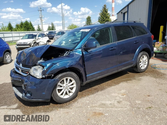 2013 Dodge Journey SXT with VIN 3C4PDCCG1DT637534, listed as a Copart auction lot 56992205 with 128,531 mi miles and Clean title. Bid and sale history available at DreamBid. Image 1.