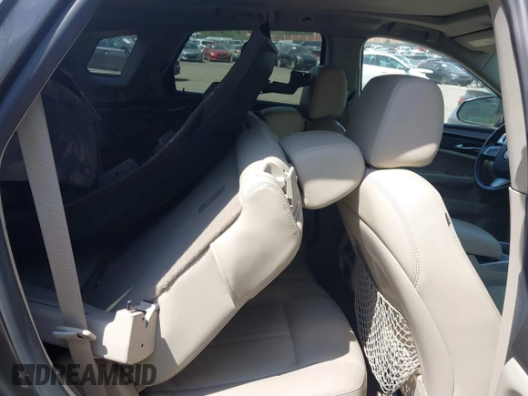2011 Cadillac SRX Premium Collection with VIN 3GYFNFEY7BS519548, listed as a IAAI auction lot 42097305 with 124,083 mi miles and . Bid and sale history available at DreamBid. Image 8.