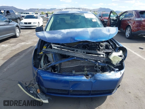 2008 Ford Focus SE with VIN 1FAHP35N08W197111, listed as a IAAI auction lot 42072726 with 109,587 mi miles. Bid and sale history available at carsss.com. Image 12.