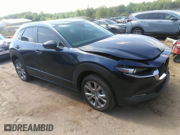 2022 Mazda CX-30 S Carbon Edition with VIN 3MVDMBCL6NM423255, listed as a IAAI auction lot 42209829 with 51,589 mi miles and . Bid and sale history available at DreamBid. Image 1.