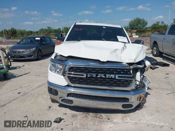2022 Ram 1500 Big Horn z VIN 1C6RRFMG2NN430198, wystawiony jako IAAI lot #41944132 z przebiegiem 54 479 mil mil oraz . Historia ofert i sprzedaży dostępna na DreamBid. Obrazek 13.