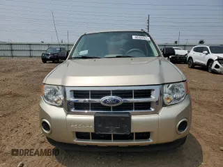 2011 Ford Escape XLS with VIN 1FMCU0C75BKC58172, listed as a Copart auction lot 60492825 with 114,518 mi miles and Salvage title. Bid and sale history available at DreamBid. Image 5.