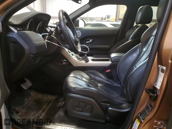 2014 Land Rover Range Rover Evoque Dynamic с VIN SALVT2BG6EH870050, выставлен на аукционе Copart как лот 42452995 с пробегом 126 143 миль миль и Списание • Salvage title. История ставок и продаж доступна на DreamBid. Изображение 7.