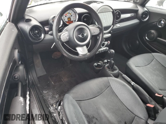 2010 MINI Convertible with VIN WMWMR3C50ATU97287, listed as a Copart auction lot 89116615 with 120,323 mi miles and Salvage Title. Bid and sale history available at DreamBid. Image 8.