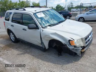 2012 Ford Escape XLT with VIN 1FMCU9D74CKB33927, listed as a IAAI auction lot 42657298 with 168,828 mi miles and . Bid and sale history available at DreamBid. Image 1.