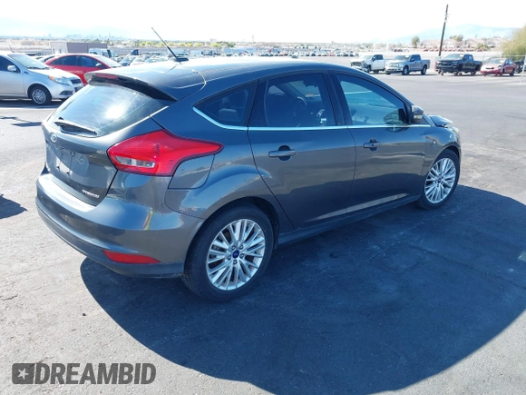 2017 Ford Focus Titanium with VIN 1FADP3N25HL299817, listed as a IAAI auction lot 42161440 with 154,974 mi miles and . Bid and sale history available at carsss.com. Image 4.