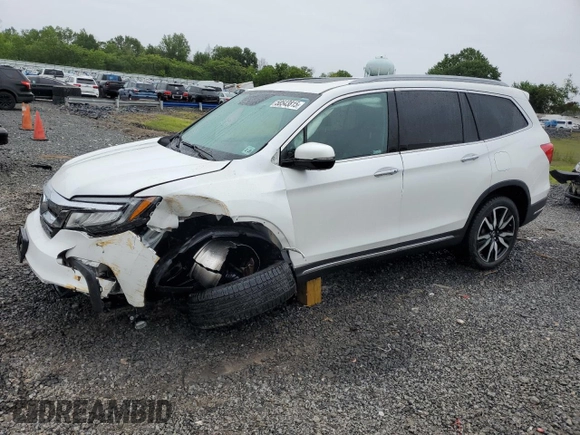 2021 Honda Pilot Elite with VIN 5FNYF6H01MB057789, listed as a Copart auction lot 58543815 with 60,602 mi miles and Salvage title. Bid and sale history available at DreamBid. Image 1.