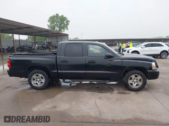 2005 Dodge Dakota SLT z VIN 1D7HE48N05S304121, wystawiony jako IAAI lot #42165773 z przebiegiem 192 886 mil mil oraz . Historia ofert i sprzedaży dostępna na DreamBid. Obrazek 13.