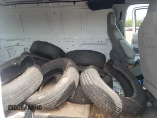 2014 Ford Econoline Cargo Commercial with VIN 1FTNE1EW3EDA66746, listed as a Copart auction lot 56550355 with 176,493 mi miles and Salvage title. Bid and sale history available at DreamBid. Image 11.