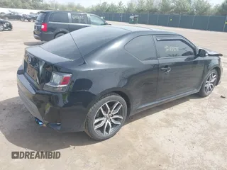 2015 Scion tC z VIN JTKJF5C75FJ012021, wystawiony jako IAAI lot #42143878 z przebiegiem 127 235 mil mil oraz . Historia ofert i sprzedaży dostępna na DreamBid. Obrazek 4.