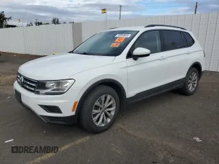 2018 Volkswagen Tiguan S with VIN 3VV0B7AX6JM111232, listed as a Copart auction lot 74944624 with 106,979 mi miles and Salvage Title. Bid and sale history available at DreamBid. Image 1.