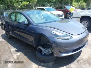 2023 Tesla Model 3 with VIN 5YJ3E1EA7PF413311, listed as a IAAI auction lot 42442055 with 25,270 mi miles and . Bid and sale history available at DreamBid. Image 1.