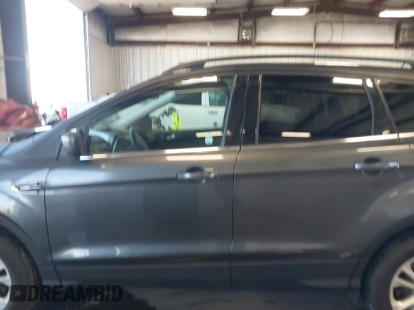 2018 Ford Escape SE with VIN 1FMCU9GD1JUC36452, listed as a IAAI auction lot 41964531 with 89,457 mi miles. Bid and sale history available at carsss.com. Image 15.