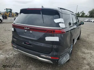 2024 Kia Carnival SX with VIN KNDNE5H37R6433828, listed as a Copart auction lot 74878214 with 0 mi miles and Salvage Title. Bid and sale history available at carsss.com. Image 3.