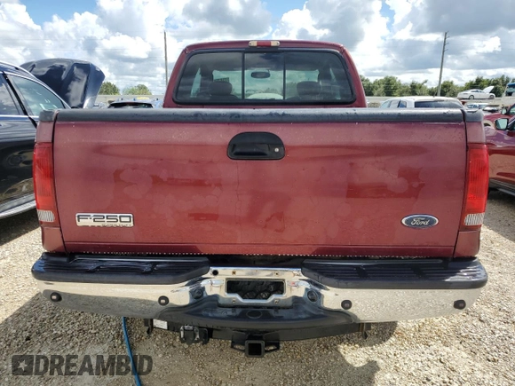 2005 Ford Super Duty F-250 XL with VIN 1FTSX21545EA06954, listed as a Copart auction lot 73829564 with 217,314 mi miles and Salvage Title. Bid and sale history available at carsss.com. Image 6.