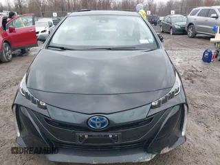 2021 Toyota Prius LE with VIN JTDKAMFP2M3165859, listed as a IAAI auction lot 41943098 with 20,306 mi miles and . Bid and sale history available at DreamBid. Image 13.