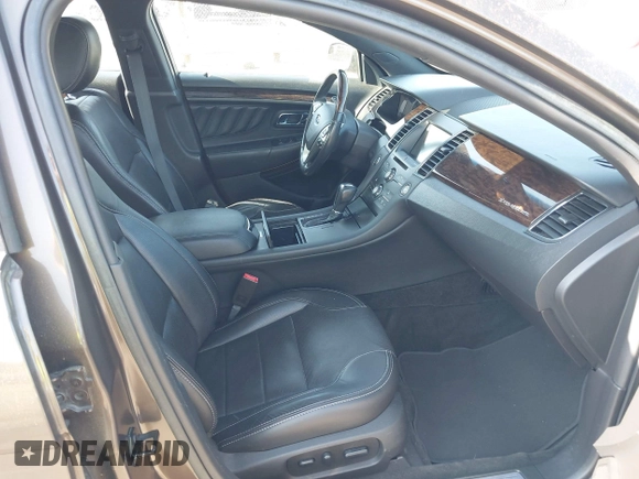 2016 Ford Taurus Limited z VIN 1FAHP2F81GG109548, wystawiony jako IAAI lot #42177871 z przebiegiem 168 611 mil mil oraz . Historia ofert i sprzedaży dostępna na DreamBid. Obrazek 5.
