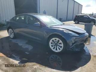2023 Tesla Model 3 with VIN 5YJ3E1EA7PF456613, listed as a Copart auction lot 56940255 with 35,920 mi miles and Non repairable. Bid and sale history available at DreamBid. Image 4.