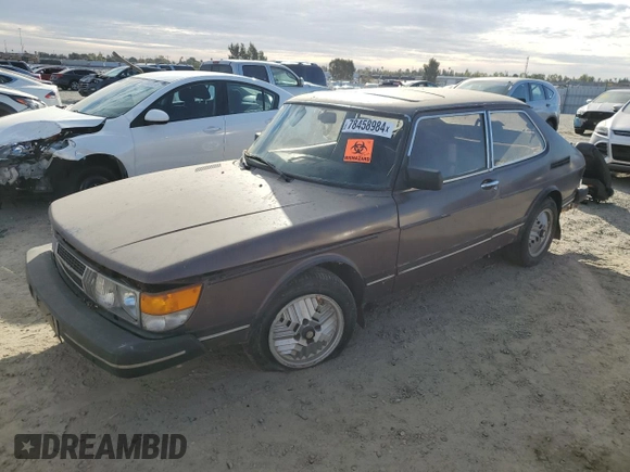 1983 Saab 900 z VIN YS3AS33S4D2012751, wystawiony jako Copart lot #78458984 z przebiegiem 219 035 mil mil oraz Czysty tytuł • Clean title. Historia ofert i sprzedaży dostępna na DreamBid. Obrazek 1.