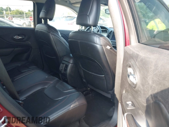2019 Jeep Cherokee Trailhawk with VIN 1C4PJMBX5KD421043, listed as a IAAI auction lot 42570336 with 114,463 mi miles and . Bid and sale history available at DreamBid. Image 8.
