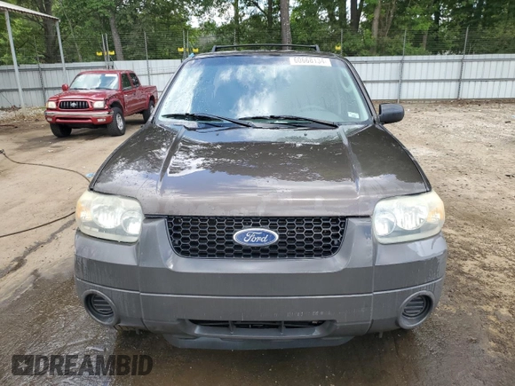 2006 Ford Escape XLS with VIN 1FMYU02Z56KD47674, listed as a Copart auction lot 60668134 with 248,535 mi miles and Salvage Title. Bid and sale history available at carsss.com. Image 5.
