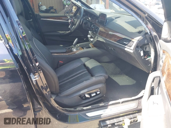 2018 BMW 5 Series 530e xDrive with VIN WBAJB1C51JB374308, listed as a IAAI auction lot 41965038 with 122,791 mi miles and . Bid and sale history available at carsss.com. Image 5.