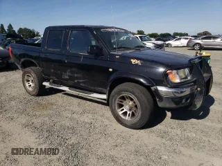 2000 Nissan Frontier XE z VIN 1N6ED27Y3YC324102, wystawiony jako Copart lot #56922155 z przebiegiem 202 233 mil mil oraz Szkoda całkowita • Salvage title. Historia ofert i sprzedaży dostępna na DreamBid. Obrazek 4.