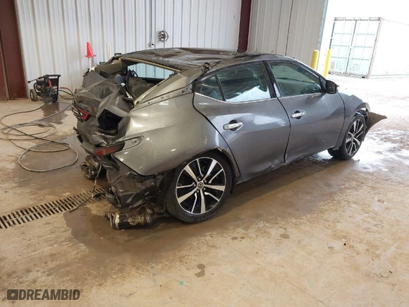 2021 Nissan Maxima SV with VIN 1N4AA6CV9MC513527, listed as a IAAI auction lot 40056232 with 54,583 mi miles. Bid and sale history available at carsss.com. Image 4.