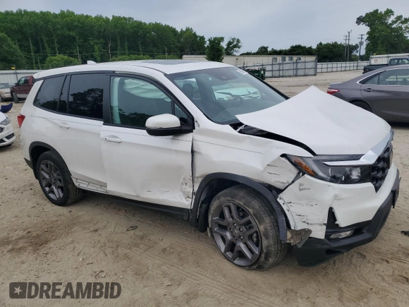 2023 Honda Passport EX-L z VIN 5FNYF8H51PB033343, wystawiony jako Copart lot #56594665 z przebiegiem 18 554 mil mil oraz Szkoda całkowita • Salvage title. Historia ofert i sprzedaży dostępna na DreamBid. Obrazek 4.
