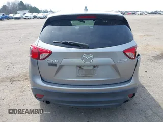 2015 Mazda CX-5 Touring with VIN JM3KE2CY6F0432910, listed as a IAAI auction lot 41784545 with 210,787 mi miles. Bid and sale history available at carsss.com. Image 16.